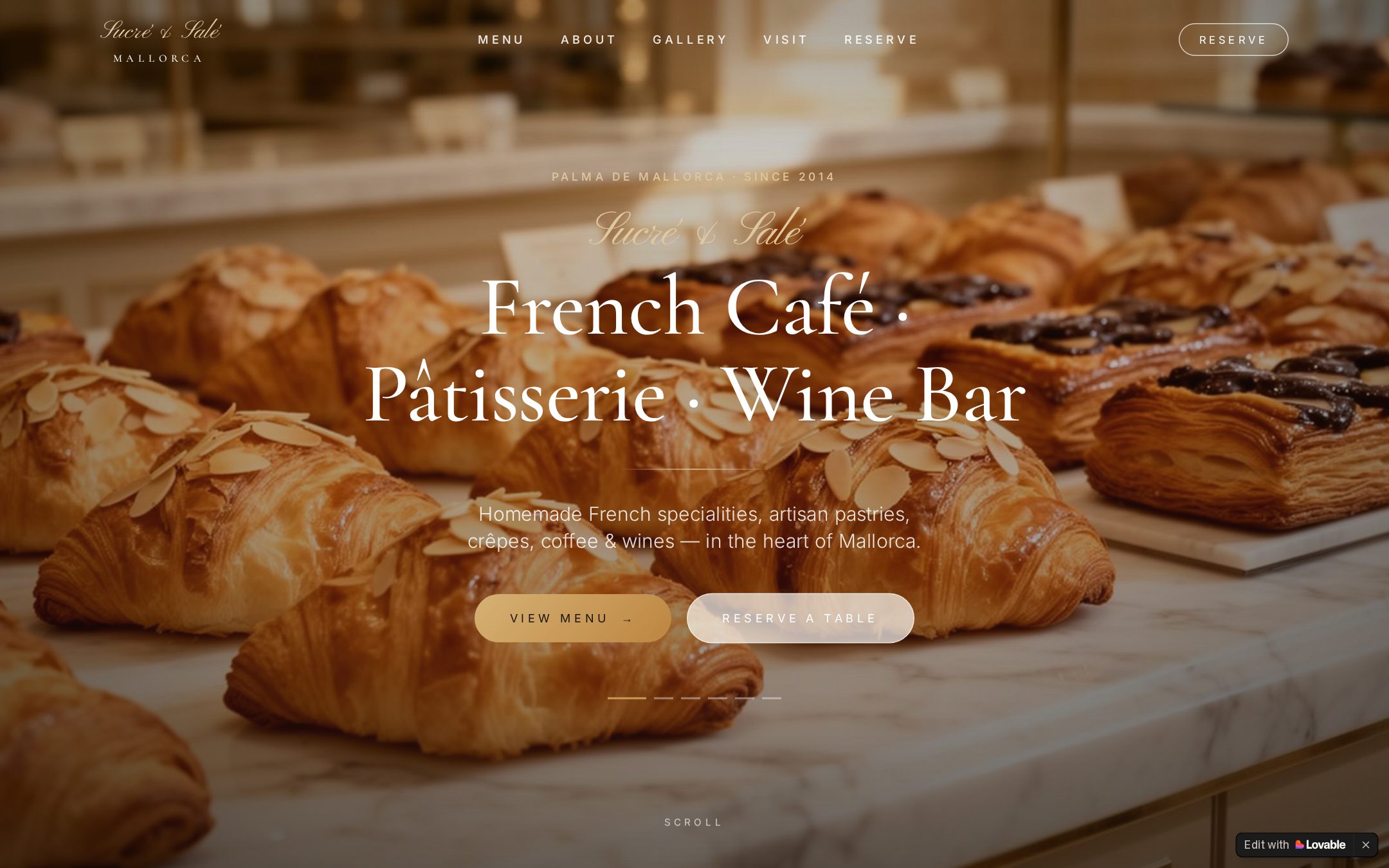Sucré & Salé café website homepage with pastry photography and elegant serif typography